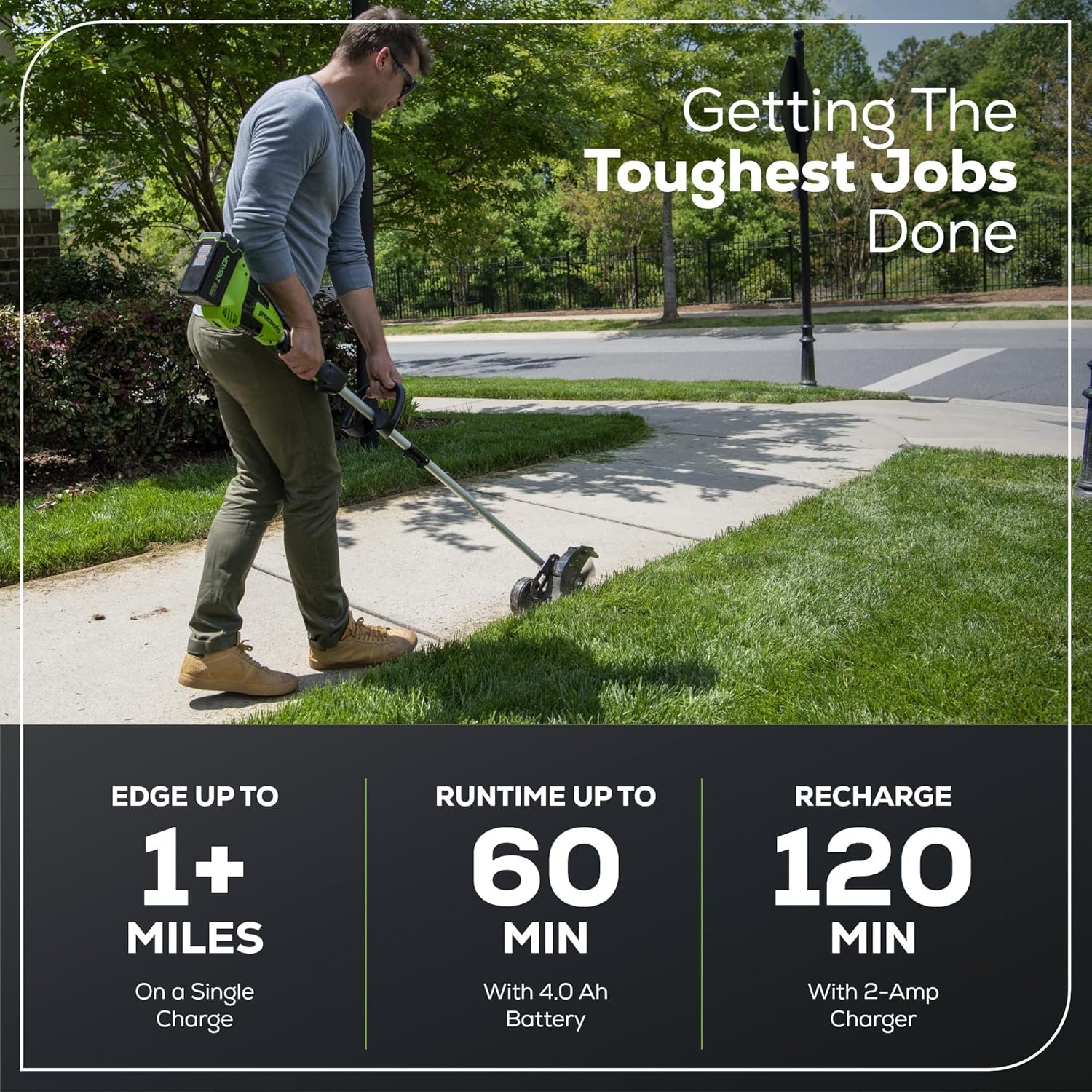 Greenworks cordless edger in use along a driveway edge