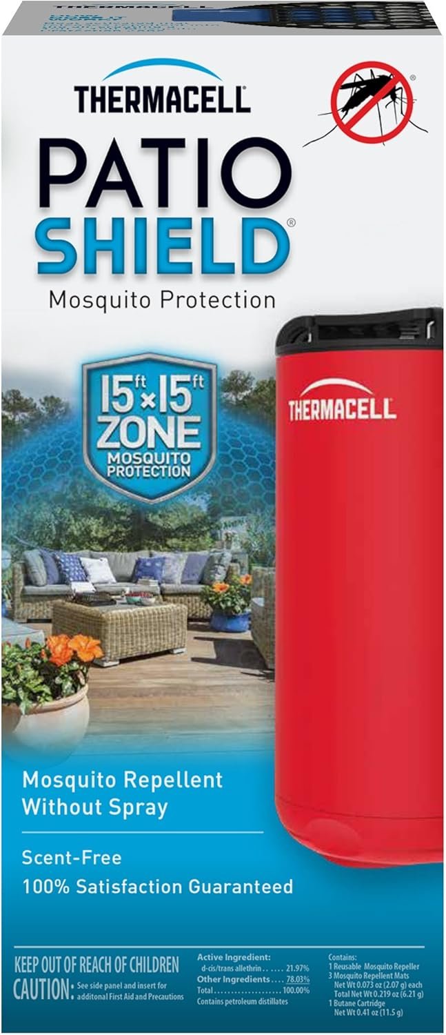 Thermacell Patio Shield in use on backyard table at dusk