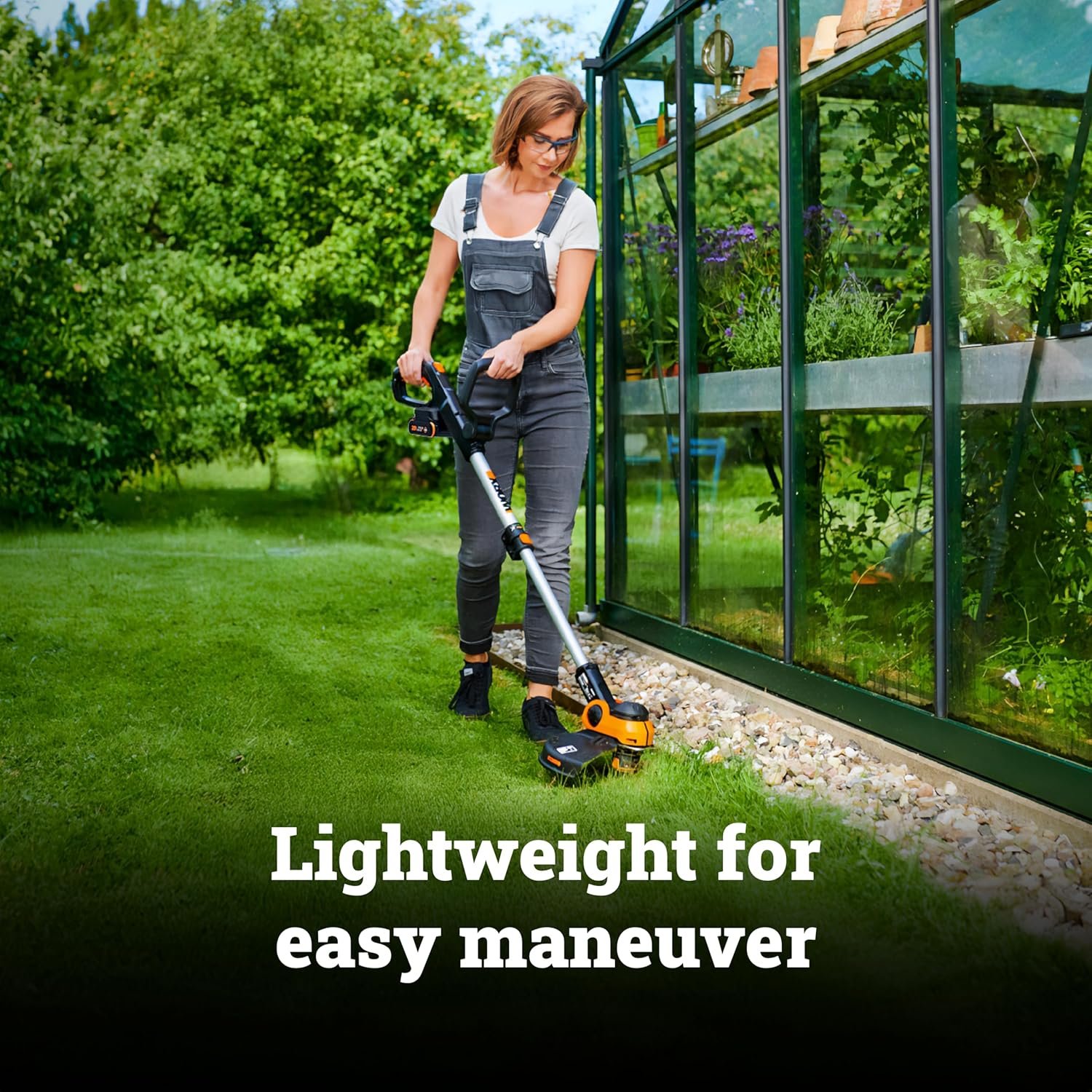 WORX 20V edger trimming along sidewalk in backyard
