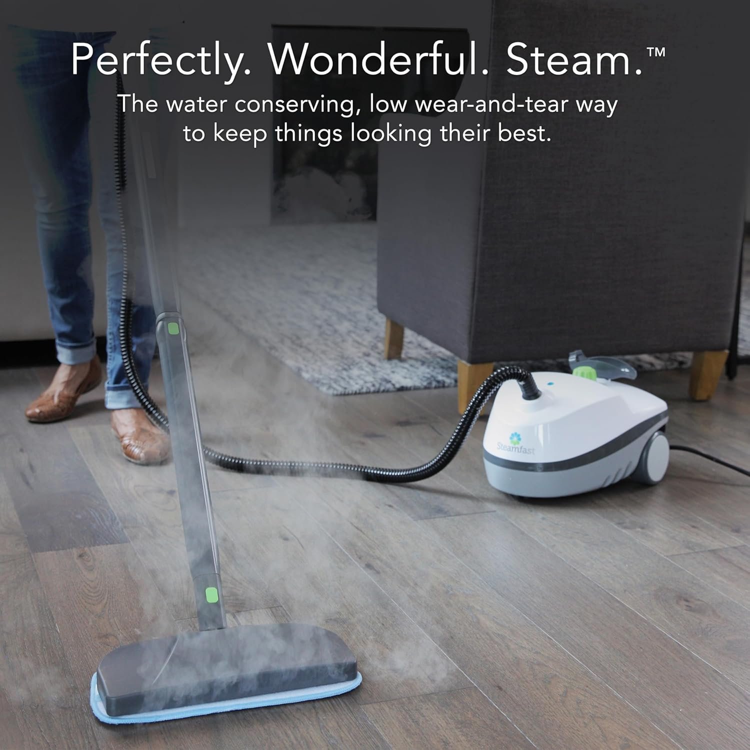 Steamfast SF-370WH steam cleaner mopping a hardwood floor in a living room